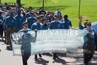 Supporters of Sexual Assault Awareness and Prevention Month from NSA Philadelphia and its tenant commands create a &quot;sea of teal&quot; on their awareness walk across April 23, 2019 in Philadelphia. (Defense Logistics Agency/John Dwyer)