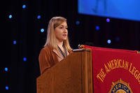 Military.com reporter Oriana Pawlyk addresses the American Legion National Convention Aug. 29, 2019, after receiving the 4th Estate Award for her reporting on prophylactic medication for Air Force pilots (American Legion)