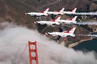 The Air Force Air Demonstration Squadron Thunderbirds Delta flies over the Golden Gate Bridge.