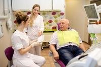 Older man sitting in dentist chair