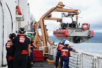 The U.S. Coast Guard cutter Harriet Lane (WMEC 903) boat detail crew prepares to launch a 26-foot, over-the-horizon small boat near Samoa.
