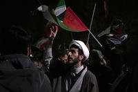 A cleric chants slogans during an anti-Israeli gathering in Tehran, Iran.