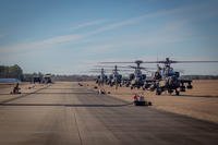 AH-64E Apache helicopters are refueled at Oxford, MS