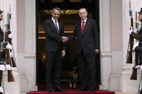 Greece's Prime Minister Kyriakos Mitsotakis welcomes Turkey's President Recep Tayyip Erdogan