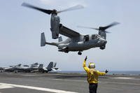 MV-22 Osprey lands on the flight deck of the USS Abraham Lincoln in the Arabian Sea