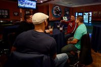 The Aviano’s Integral Men group watches football and chats during their inaugural event, Nov. 15, 2014, at Aviano Air Base, Italy. AIM is a new group tailored to husbands of active-duty service members. Staff Sgt. R.J. Biermann/Air Force