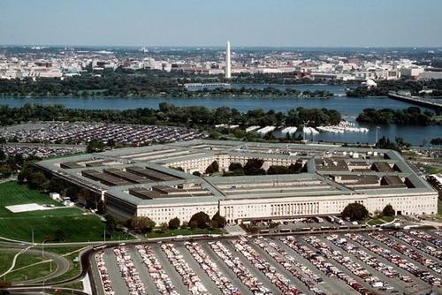 The Pentagon, headquarters of the U.S. Department of Defense, in Arlington, Virginia, on May 1, 2007, with the Washington Monument visible across the Potomac River.  (DoD photo)