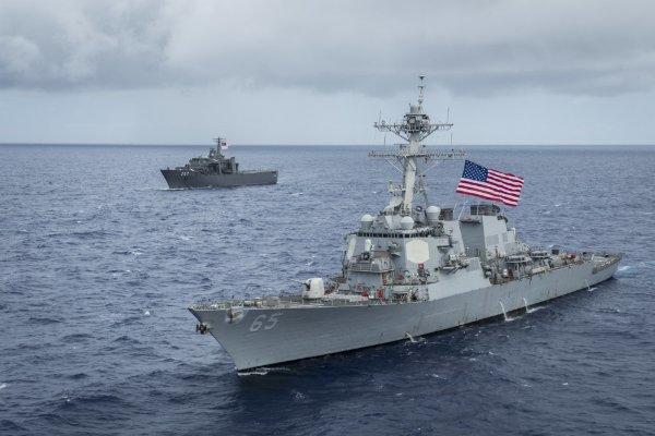 The Arleigh Burke-class guided-missile destroyer USS Benfold (DDG 65) and Republic of Singapore Navy's (RSN) RSS Endurance (LST 207), participate in an exercise off the coast of Guam, Aug. 28, 2017. (Navy Photo by Benjamin A. Lewis)