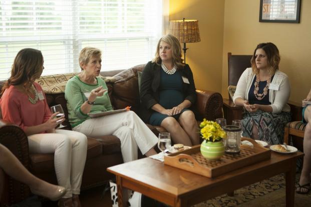 Ellyn Dunford, wife of U.S. Marine Corps Gen. Joseph F. Dunford Jr., former Commandant of the Marine Corps, speaks with wives of enlisted Marines and officers. (U.S. Marine Corps/Chloe Nelson)