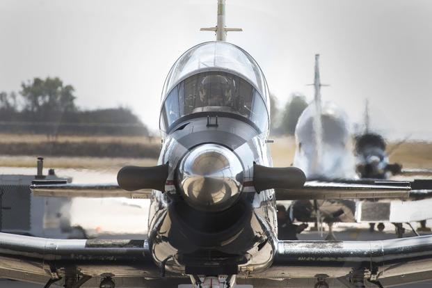 Pilots prepare to taxi on the flightline in a T-6 Texan II on Nov. 1, 2017, at Vance Air Force Base, Oklahoma. The Air Force grounded its T-6 fleet last week after hypoxia-related incidents. The T-6 is used to train specialized undergraduate pilot training students, providing the basic skills necessary to progress to more specialized aircraft. (U.S. Air Force photo by Senior Airman Corey Pettis) 