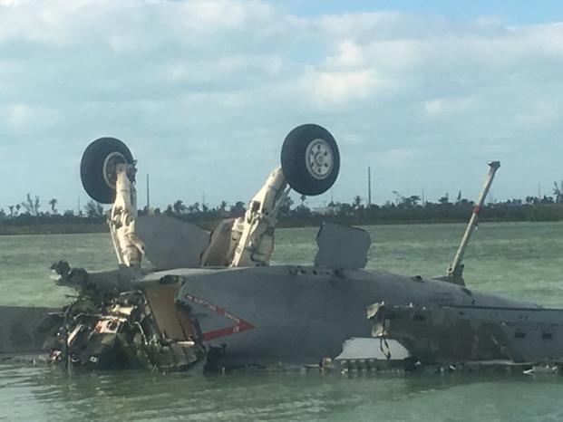 An F/A-18F Super Hornet lies upside down after crashing off the coast of Key West March 14, 2018. Photo courtesy Jack and Clay Lockamy.