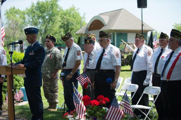 Col. Eric Laughton, commander of the 107th Medical Group, 107th Attack Wing, New York Air National Guard, Niagara Falls Air Reserve Station, addresses the crowd in attendance at the Memorial Day ceremony in Lewiston, N.Y., May 28, 2018. The ceremony is hosted annually by the Veterans of Foreign Wars, Down River Post #7487, honoring those who gave their lives while serving in the armed forces. (U.S. Air National Guard/Brandy Fowler)