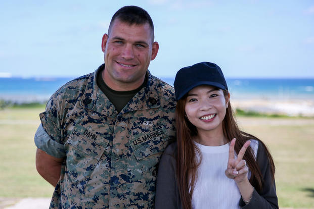 Marine Corps Gunnery Sgt. Scott Michael Dahn and Ching-Yi Sze pose for a photo in Okinawa, Japan, May 24, 2018. Dahn rescued Ching-Yi while she was scuba diving at Okinawa’s Maeda Point, May 20, 2018. (Marine Corps photo/Andrew Neumann)