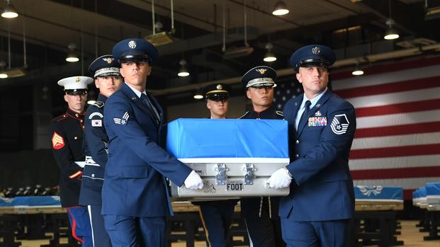Honor guard from NATO countries participate in a dignified transfer as part of a repatriation ceremony on Osan Air Base, Republic of Korea, Aug. 1, 2018. (Benjamin Raughton/U.S. Air Force)