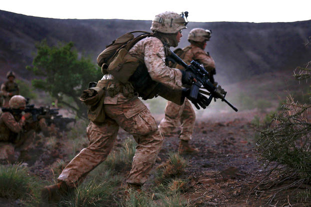 U.S. Marines maneuver toward an objective during a live-fire and movement exercise at D’Arta Plage, Djibouti on Nov. 3, 2014. Department of Defense photo