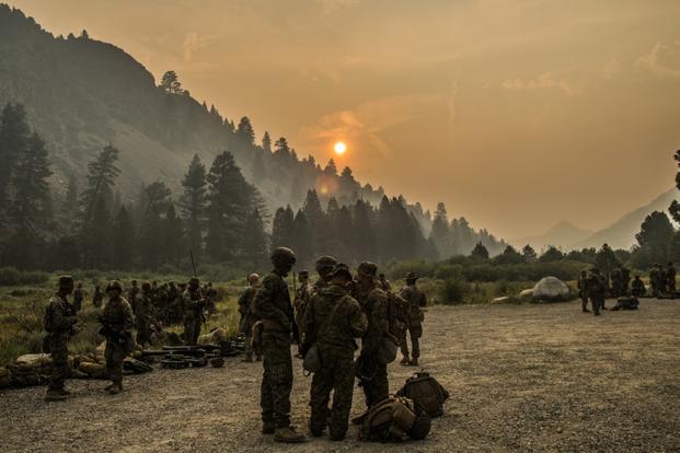 Marines with India Company, 3rd Battalion, 5th Marine Regiment, 1st Marine Division, stage their gear after conducting cliff assault operation during Mountain Training Exercise 4-18 aboard Mountain Warfare Training Center Bridgeport, Calif., July 30, 2018. (Adam Dublinske/U.S. Marine Corps)