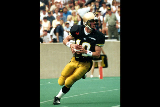 Army QB Chad Jenkins (USMA '02) in action. (Photo from Joint Base Lewis McChord Flickr page)