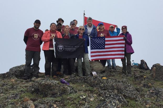 A group with the Travis Manion Foundation stands at the top of Gold Star Peak, Alaska. (Photo courtesy of Luke Bushatz)