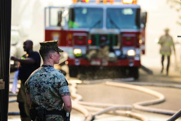 Marines from the Barracks Washington responded to a fire at a neighboring senior housing complex, September 19, 2018. (U.S. Marine Corps/Cpl. Damon A. Mclean) 