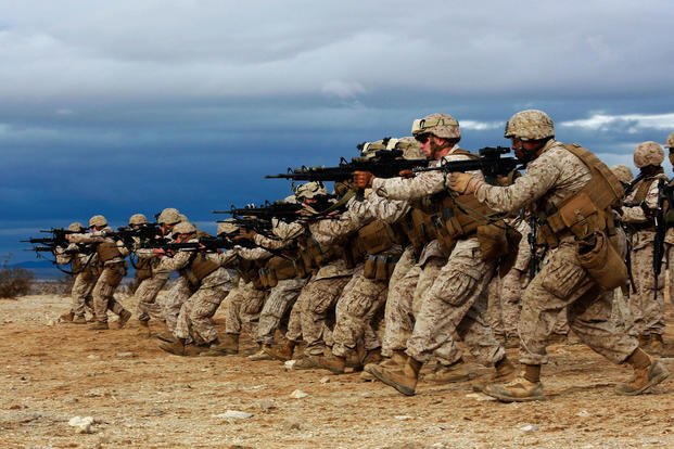 U.S. Marines with Combat Logistics Detachment 1, Combat Logistics Battalion 13, 1st Marine Logistics Group, practice "combat gliding" during Integrated Training Exercise 2-15 at Camp Wilson on Twentynine Palms, California, Jan. 31, 2015. (U.S. Marine Corps photo/Kathryn Howard)