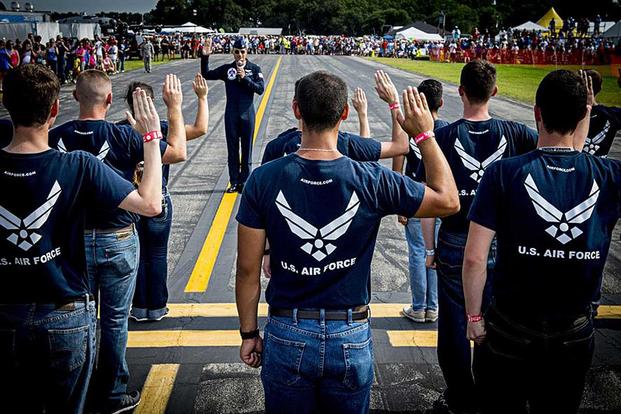  New Airmen take the oath of enlistment at an air show in Lakeland, Fla., in 2015. (Courtesy photo)
