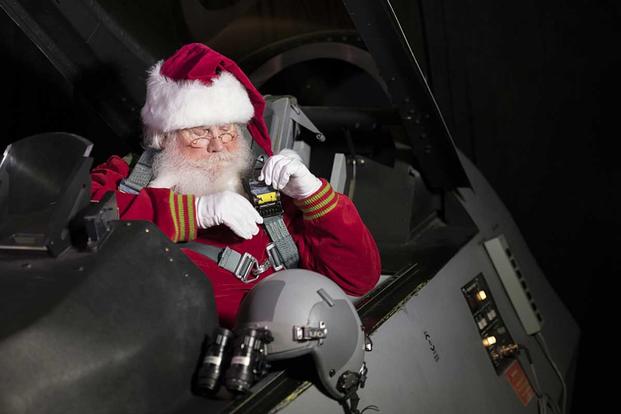 Santa, shown here at Buckley Air Force Base, has been flying practice runs in Colorado, using simulators and even getting into a jet for test runs, NORAD said. Courtesy photo