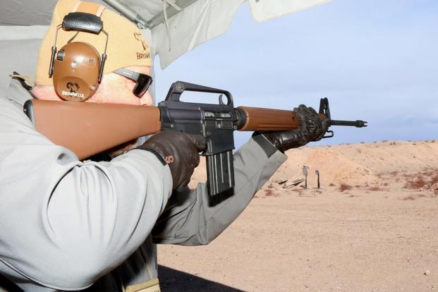 Roy Hill from Brownells fires the firm’s new BRN Proto Retro Rifle which is based on the original AR-15 prototype. (Military.com/Matthew Cox)