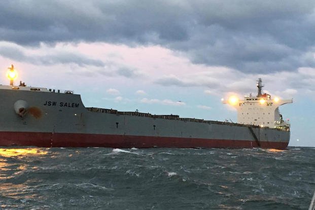 The JSW Salem sits aground after it ran aground about 2.5 miles east of Virginia Beach, Virginia, Jan. 10, 2019. A 45-foot Response Boat-Medium crew from Station Little Creek and an MH-60 Jayhawk helicopter crew from Air Station Elizabeth City assisted the crew of a bulk carrier ship as they refloated and anchored the vessel later that morning. (U.S. Coast Guard photo/Nathan Reynolds)