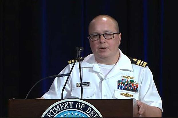 Navy Lt. Cmdr. Blake Dremann speaks at the Pentagon's ceremony in honor of LGBT pride month in June 2018. (Defense Department video)