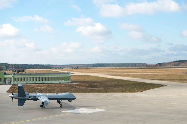 A remotely piloted MQ-9 Reaper taxis toward the runway shortly after a ribbon-cutting ceremony at Miroslawiec Air Base, Poland, March 1, 2019. (U.S. Air Force photo/Preston Cherry)
