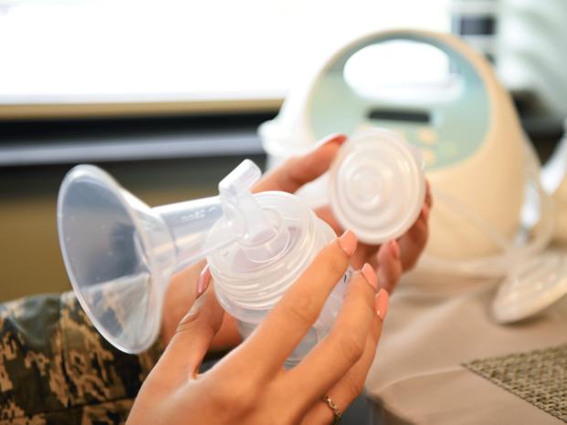 An Airman sets up a breastfeeding pump in a breastfeeding room at Joint Base Charleston, S.C.  (US Air Force/Tenley Long)