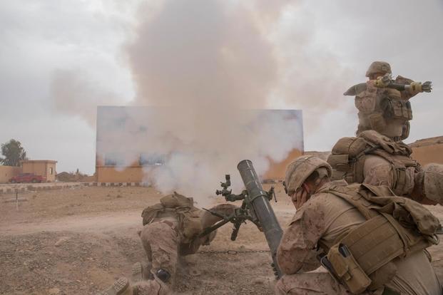 U.S. Marines fire an M120 Mortar round at known ISIS staging areas in the Middle Euphrates River Valley's Deir Ezzor province, Syria, Oct. 12, 2018. (U.S. Army/Sgt. Matthew Crane)