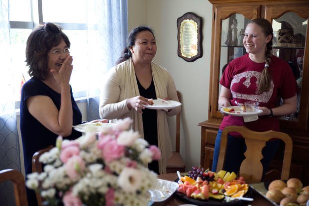 Aya Shinjyo, left, shares a laugh with Audrey C. Mills, center, and her sister-in-law, Jewell Mills, during a brunch at Camp Foster, Japan. (Marine Corps/Thor J. Larson)
