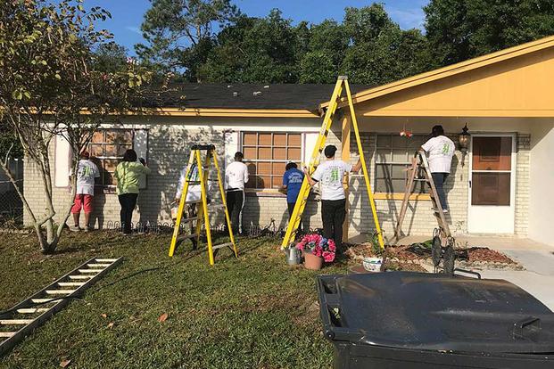 Dozens of members of the Hillsborough County Fire Rescue and their families painted the house belonging to William Velez, a blind World War II veteran, on April 13, 2019. Facebook photo