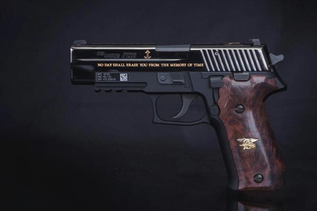Commemorative pistol presented by Sig Sauer to retired Master Chief Special Warfare Operator Britt Slabinski to coincide with the launch of the documentary “For Service As Set Forth: The Story of CMC Britt Slabinski, Congressional Medal of Honor Recipient.” (Courtesy of Sig Sauer)