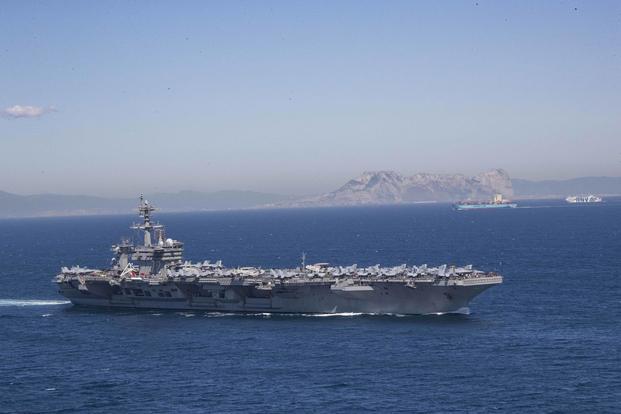 The Nimitz-class aircraft carrier USS Abraham Lincoln (CVN 72) transits the Strait of Gibraltar, entering the Mediterranean Sea as it continues operations in the U.S. 6th Fleet area of responsibility. (U.S. Navy/Mass Communication Specialist 2nd Class Clint Davis)