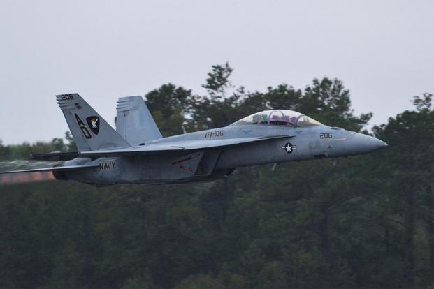 An F/A-18 Hornet from the East Coast Super Hornet Demonstration Team assigned to Strike Fighter Squadron (VFA) 106 takes off at the 2011 Naval Air Station Oceana Air Show. (U.S. Navy/Mass Communication Specialist Seaman Antonio P. Turretto Ramos)