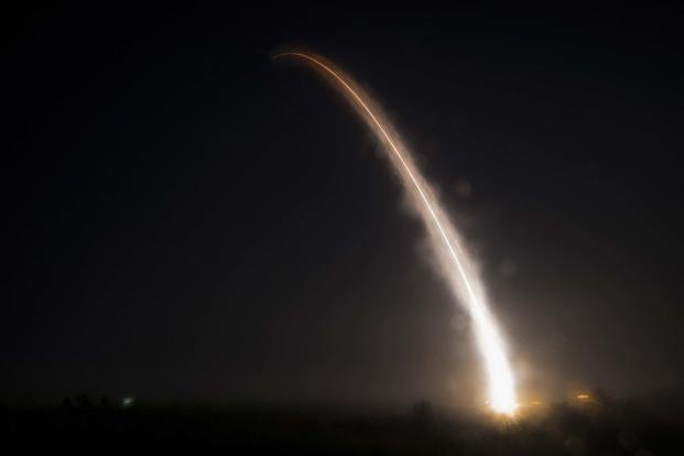 An unarmed Minuteman III intercontinental ballistic missile launches during a test.