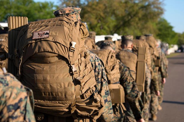 U.S. Marines rucksack during a U.S. Marine Corps Forces Central Command noncommissioned officers (NCO) field exercise. (U.S. Marine Corps/Caleb Nunez)