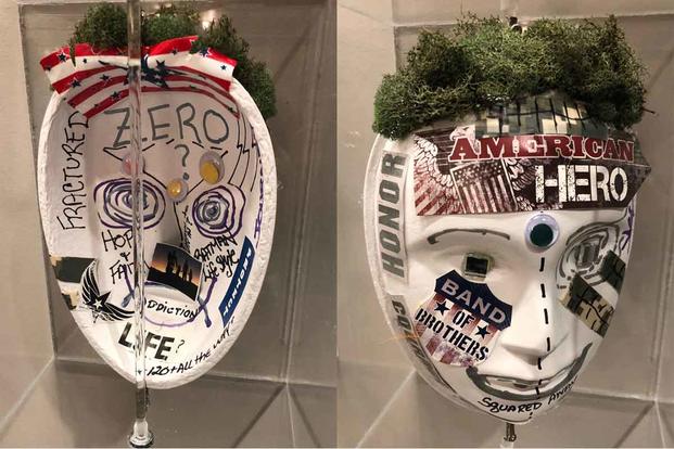 As part of the intensive clinical program for post-traumatic stress at Home Base, veterans decorate masks that illustrate how they believe they present themselves to the world, contrasted with how they truly feel about themselves. Here are the two sides of one veteran's mask. (Hope Hodge Seck/Military.com)