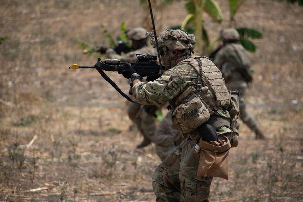 U.S Soldiers from 1-27 Infantry Regiment, Wolfhounds, 2nd Infantry Brigade Combat Team, 25th Infantry Division get on line on Platoon Live Fire lanes on August 26 2019 at Puslatpur Marine Base, Indonesia. U.S Forces conducted required training such as platoon live fires to increase readiness while participating in Exercise Garuda Shield. (Leah Ganioni/U.S. Army)