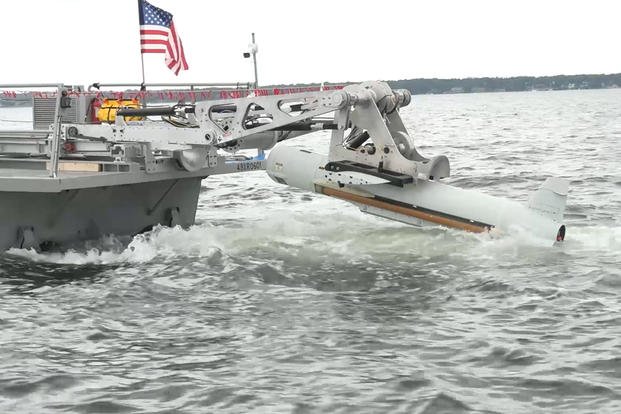 An AQS-20 Sonar Deployed from a USV