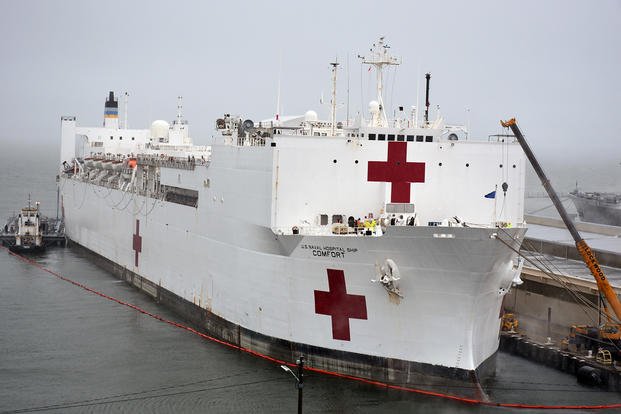 USNS Comfort (T-AH 20) takes on fuel and supplies
