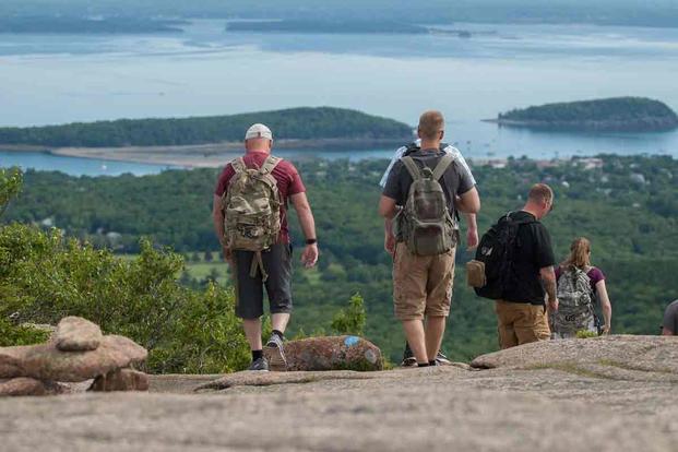 Soldiers from the Maine Army National Guard hike in Acadia National Park.