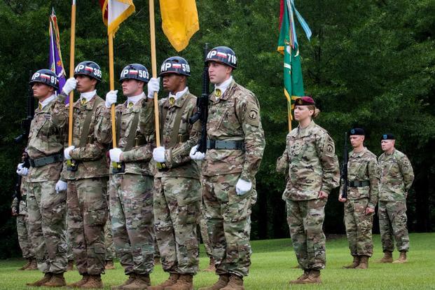 Command Sgt. Maj. Veronica E. Knapp, incoming Command Sgt. Maj. of 16th Military Police Brigade, posts in her newly appointed leadership position during a dual Change of Command/ Responsibility ceremony at Fort Bragg, North Carolina July 12, 2019. (Brittany L. Downing/U.S. Army)