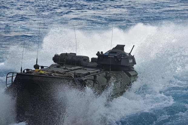 assault amphibious vehicle departs the well deck of USS San Diego