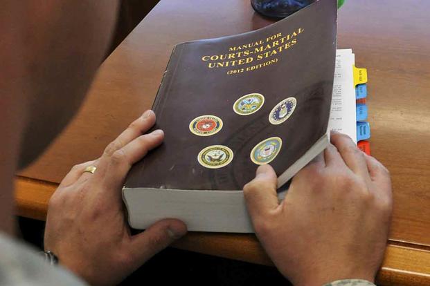 The Manual for Courts-Martial. Army photo