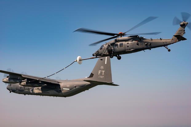 HH-60W Jolly Green II connects with an HC-130J tanker