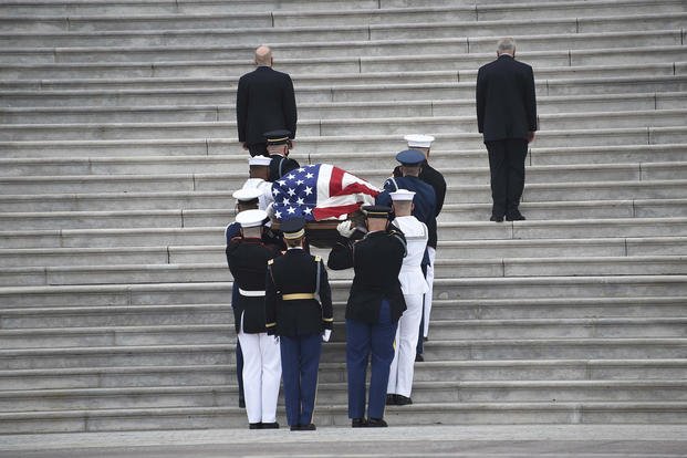 Armed Forces Body Bearer team carry the remains of Supreme Court Justice Ruth Bader Ginsburg