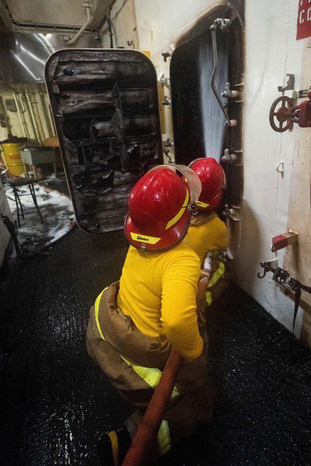 Coast Guard Cutter Waesche crew members conduct overhaul